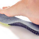 FAITERM: orthopedic insole and female leg above it